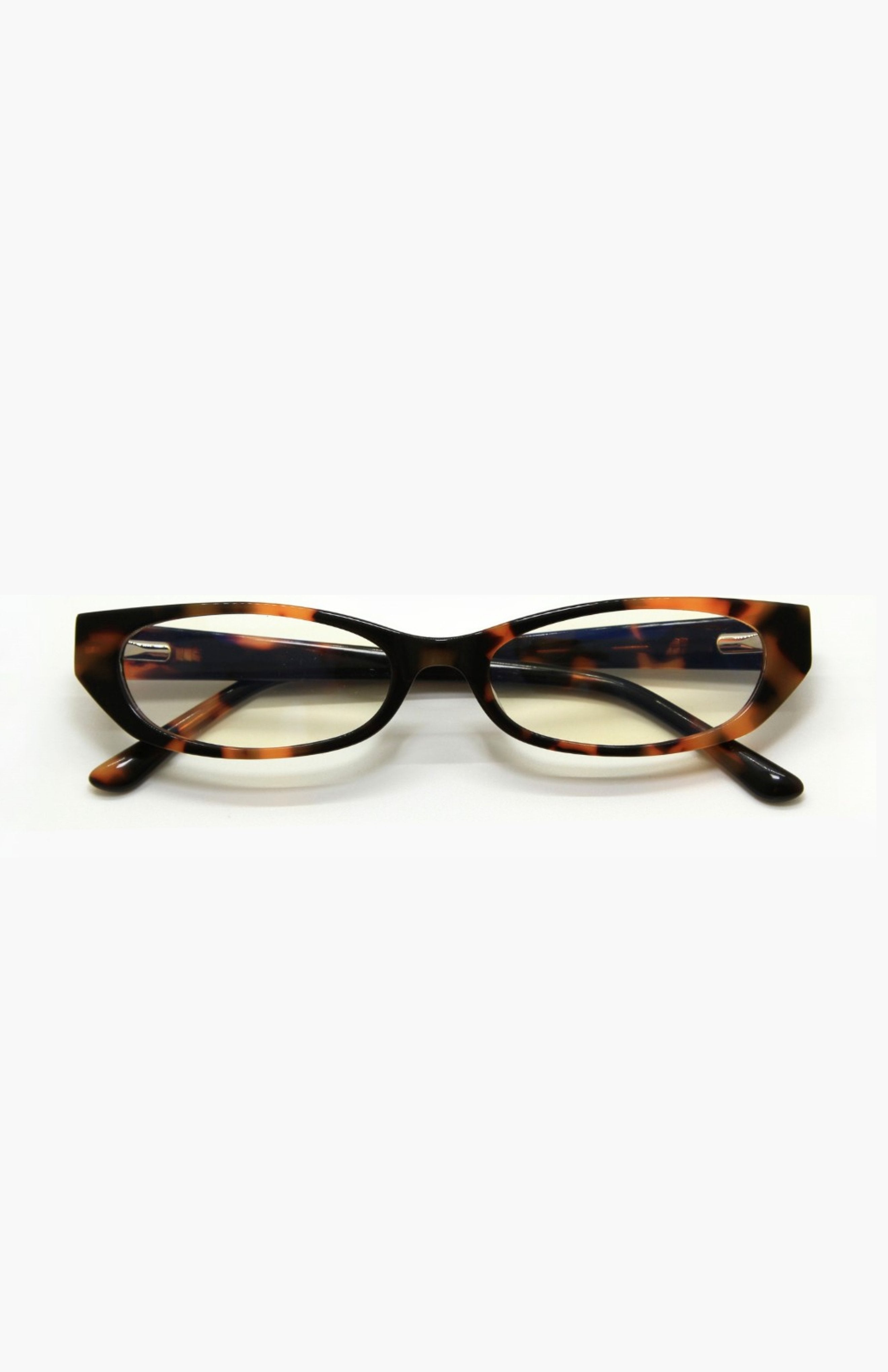 Tortoiseshell cat-eye glasses on a white background