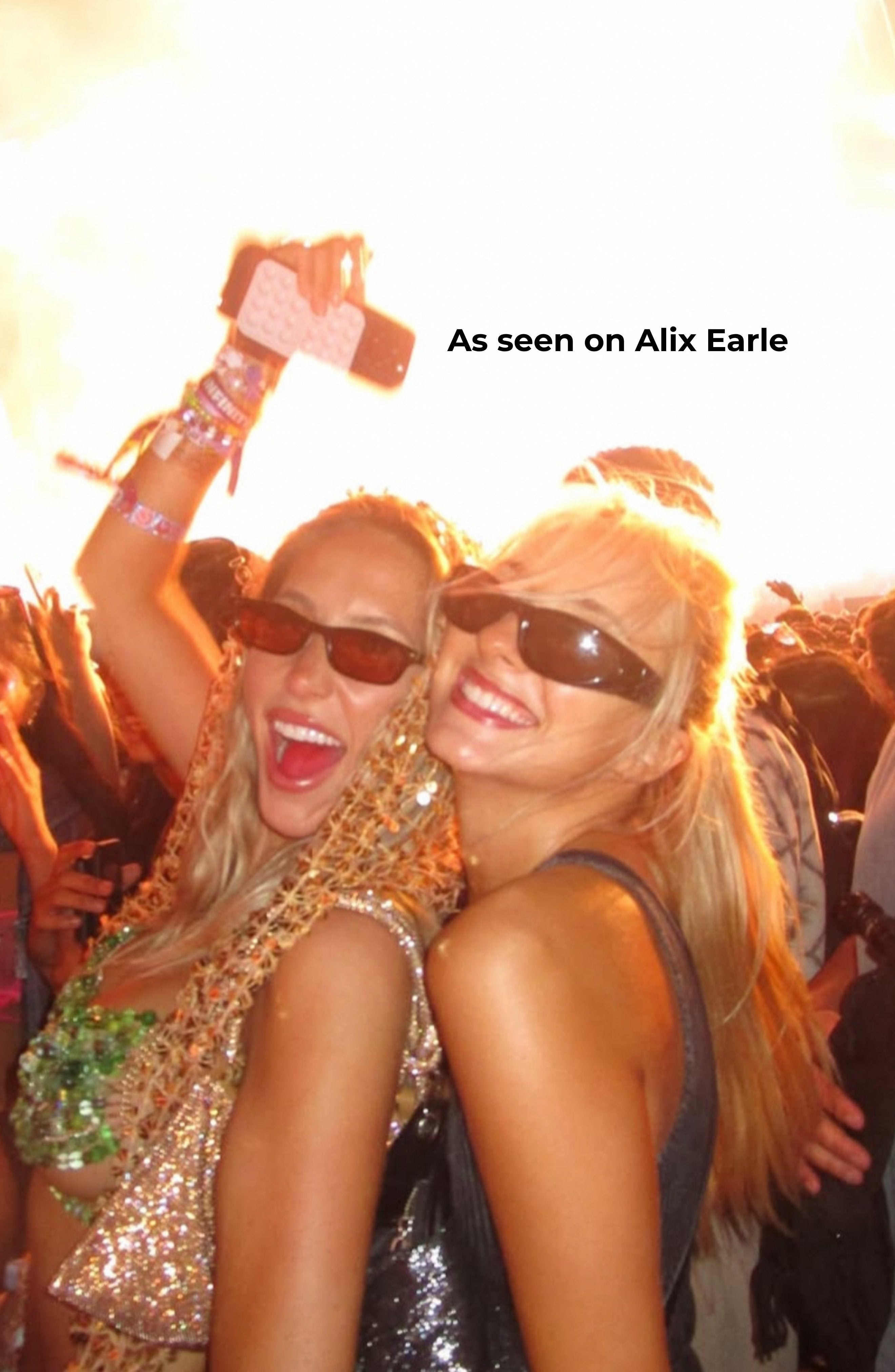 Two women posing together with a crowd in the background, text 'As seen on Alix Earle' displayed.