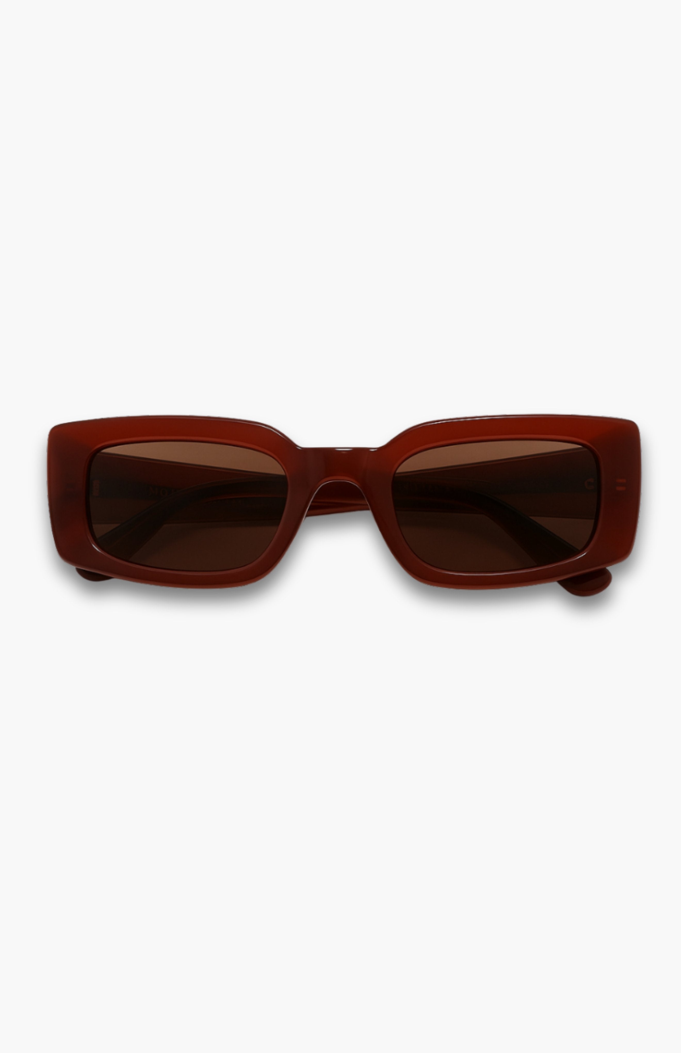 Brown sunglasses on a white background