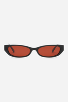 Black sunglasses with red lenses on a white background
