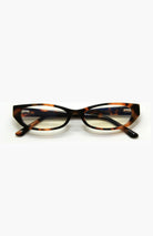 Tortoiseshell cat-eye glasses on a white background