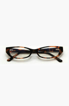 Tortoiseshell cat-eye glasses on a white background