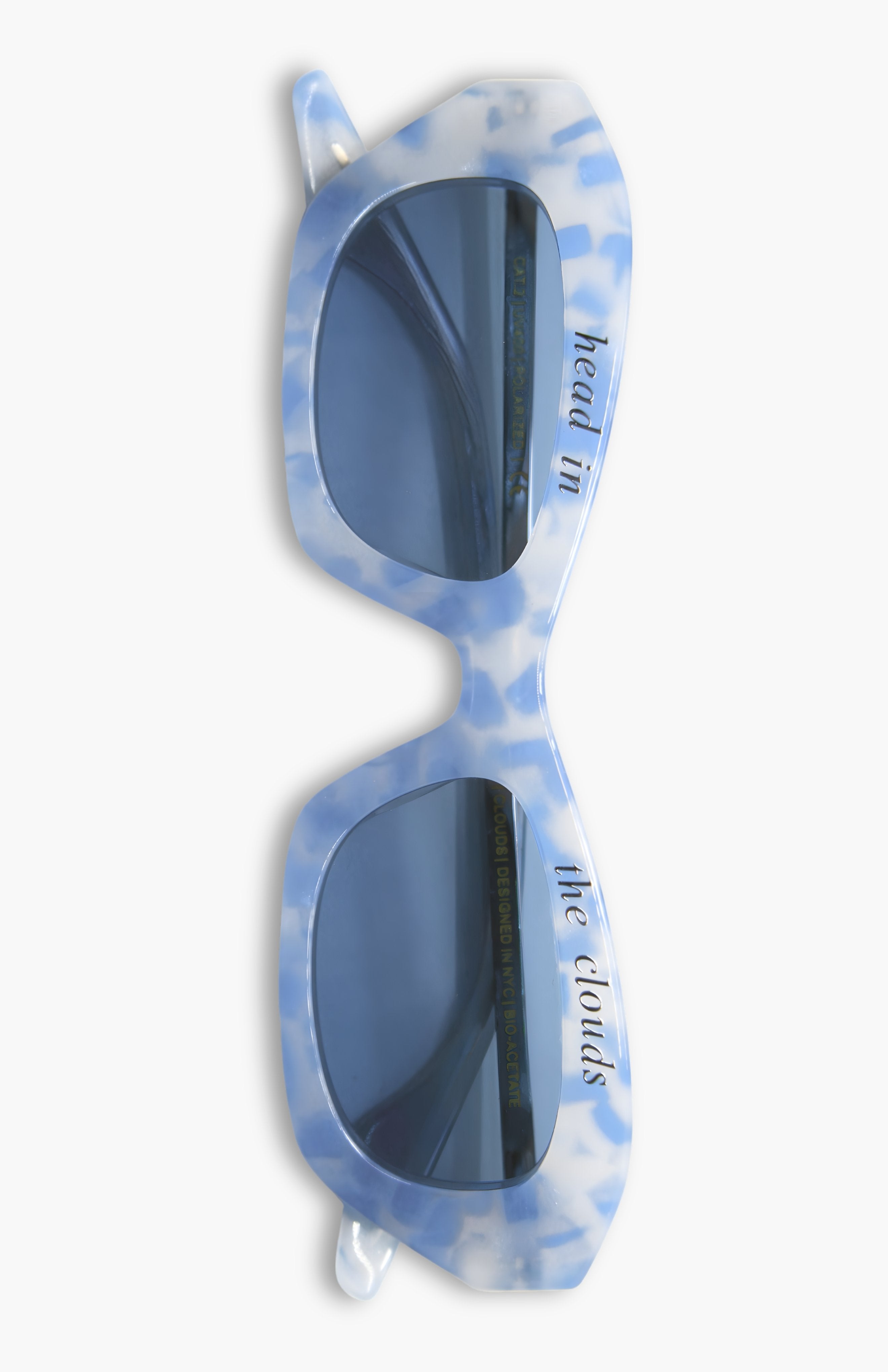 Blue and white sunglasses with a pattern on a white background