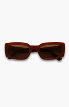 Brown sunglasses on a white background