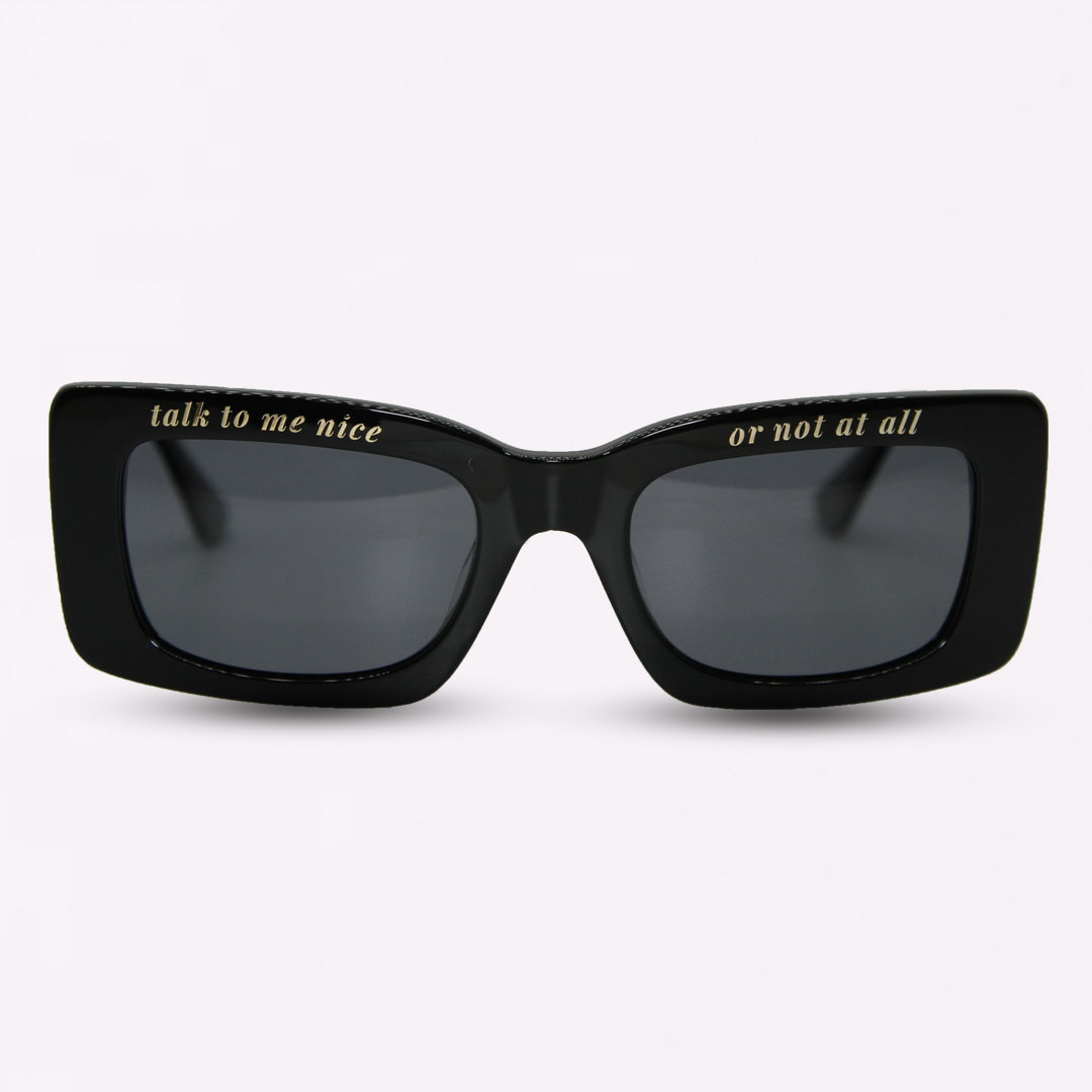 a model wears Black Future So Bright Sunglasses