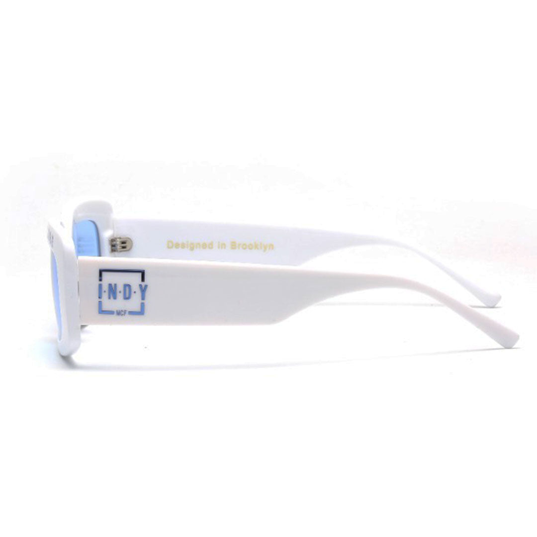 a side image of white square frame sunglasses